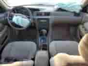 2001 Toyota Camry LE z VIN 4T1BG22K01U113094, wystawiony jako Copart lot #80082145 z przebiegiem 190 222 mil mil oraz Szkoda całkowita • Salvage title. Historia ofert i sprzedaży dostępna na DreamBid. Obrazek 8.