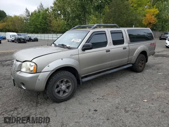 2004 Nissan Frontier XE z VIN 1N6ED29Y34C414129, wystawiony jako Copart lot #73254724 z przebiegiem 247 106 mil mil oraz Szkoda całkowita • Salvage title. Historia ofert i sprzedaży dostępna na DreamBid. Obrazek 1.