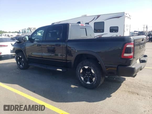 2024 Ram 1500 Rebel z VIN 1C6SRFLT8RN202504, wystawiony jako Copart lot #61017665 z przebiegiem 28 596 mil mil oraz Czysty tytuł • Clean title. Historia ofert i sprzedaży dostępna na DreamBid. Obrazek 2.