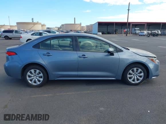 2021 Toyota Corolla LE with VIN JTDEPMAE7MJ147421, listed as a IAAI auction lot 43142290 with Not provided miles and . Bid and sale history available at DreamBid. Image 12.