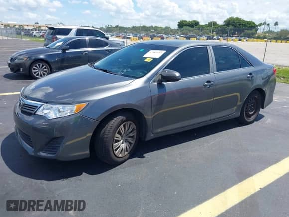 2012 Toyota Camry L z VIN 4T1BF1FK5CU629140, wystawiony jako IAAI lot #42885614 z przebiegiem 94 732 mil mil oraz . Historia ofert i sprzedaży dostępna na DreamBid. Obrazek 17.