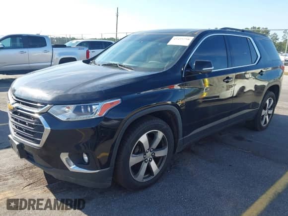 2019 Chevrolet Traverse LT with VIN 1GNEVHKW8KJ233538, listed as a IAAI auction lot 43425798 with 131,047 mi miles and . Bid and sale history available at DreamBid. Image 2.