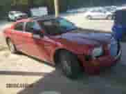 2009 Chrysler 300 LX with VIN 2C3KA43D59H565336, listed as a Copart auction lot 72015705 with 134,814 mi miles and Salvage title. Bid and sale history available at DreamBid. Image 4.