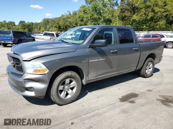 2012 Ram 1500 Express z VIN 1C6RD6KTXCS301087, wystawiony jako Copart lot #71876675 z przebiegiem 134 847 mil mil oraz Szkoda całkowita • Salvage title. Historia ofert i sprzedaży dostępna na DreamBid. Obrazek 1.
