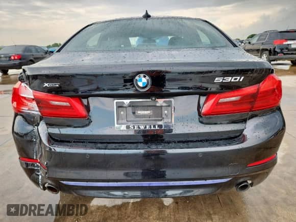 2018 BMW 5 Series 530i xDrive z VIN WBAJA7C5XJWC76654, wystawiony jako Copart lot #69140585 z przebiegiem 84 242 mil mil oraz Szkoda całkowita • Salvage title. Historia ofert i sprzedaży dostępna na DreamBid. Obrazek 6.