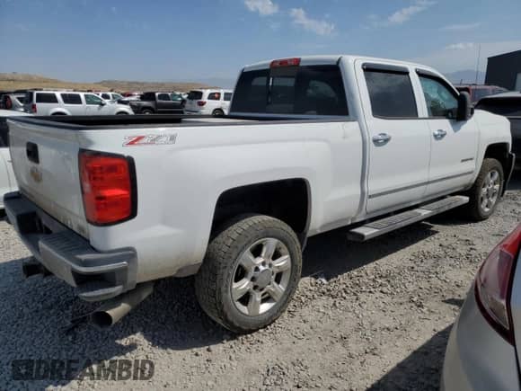 2015 Chevrolet Silverado 3500HD LTZ с VIN 1GC4K0E89FF135364, выставлен на аукционе Copart как лот 67867825 с пробегом 164 824 миль миль и Списание • Salvage title. История ставок и продаж доступна на DreamBid. Изображение 3.