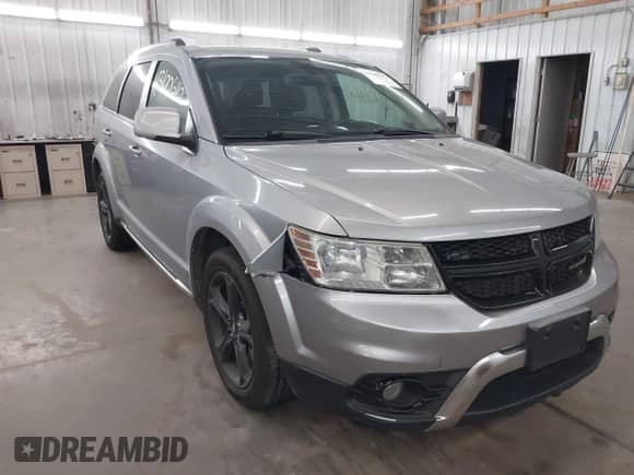 2018 Dodge Journey Crossroad with VIN 3C4PDDGG9JT386354, listed as a IAAI auction lot 43100642 with 168,989 mi miles and . Bid and sale history available at DreamBid. Image 1.