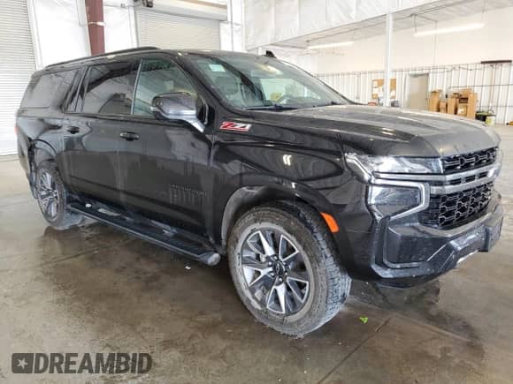 2022 Chevrolet Suburban Z71 с VIN 1GNSKDKD7NR314202, выставлен на аукционе Copart как лот 69364595 с пробегом 102 462 миль миль и Списание • Salvage title. История ставок и продаж доступна на DreamBid. Изображение 4.