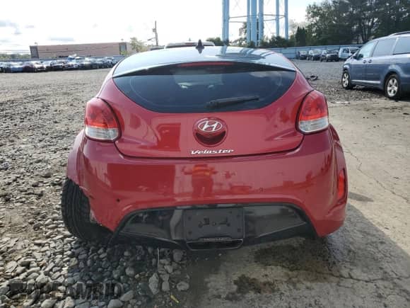 2013 Hyundai Veloster w/Black Int z VIN KMHTC6AD5DU088630, wystawiony jako Copart lot #80093115 z przebiegiem 76 327 mil mil oraz Szkoda całkowita • Salvage title. Historia ofert i sprzedaży dostępna na DreamBid. Obrazek 6.
