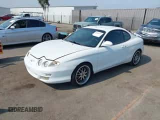 2000 Hyundai Tiburon с VIN KMHJG35F6YU202467, выставлен на аукционе IAAI как лот 42956767 с пробегом 174 269 миль миль и . История ставок и продаж доступна на DreamBid. Изображение 2.