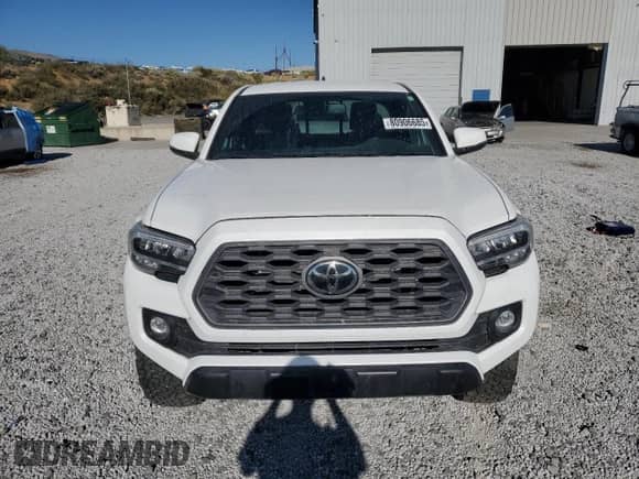 2022 Toyota Tacoma SR z VIN 3TYSZ5ANXNT090384, wystawiony jako Copart lot #80906685 z przebiegiem Nie podano mil oraz Szkoda całkowita • Salvage title. Historia ofert i sprzedaży dostępna na DreamBid. Obrazek 5.