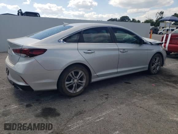 2018 Hyundai Sonata SEL с VIN 5NPE34AF0JH609374, выставлен на аукционе Copart как лот 69697265 с пробегом 149 053 миль миль и Списание • Salvage title. История ставок и продаж доступна на DreamBid. Изображение 3.