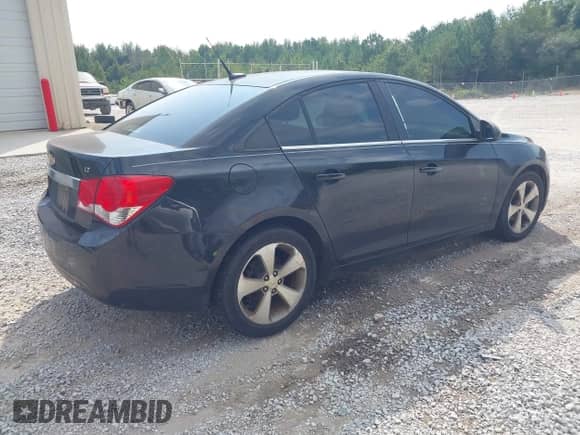 2011 Chevrolet Cruze 2LT z VIN 1G1PG5S94B7201289, wystawiony jako IAAI lot #43210274 z przebiegiem 161 323 mil mil oraz . Historia ofert i sprzedaży dostępna na DreamBid. Obrazek 4.