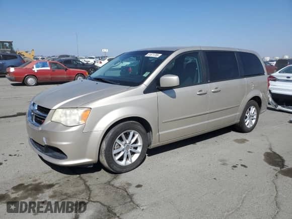 2013 Dodge Grand Caravan SXT with VIN 2C4RDGCG9DR771551, listed as a Copart auction lot 81871795 with 162,896 mi miles and Clean title. Bid and sale history available at DreamBid. Image 1.