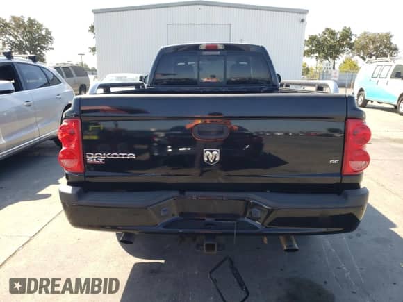 2005 Dodge Dakota SLT с VIN 1D7HE42N65S163225, выставлен на аукционе Copart как лот 80413475 с пробегом 137 282 миль миль и Списание • Salvage title. История ставок и продаж доступна на DreamBid. Изображение 6.
