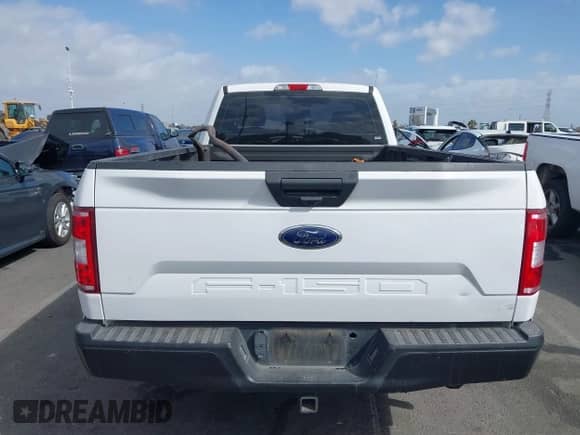 2020 Ford F-150 XL with VIN 1FTMF1CB8LKD61939, listed as a IAAI auction lot 43433710 with 123,729 mi miles and . Bid and sale history available at DreamBid. Image 16.