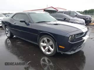2011 Dodge Challenger R/T z VIN 2B3CJ5DT1BH558368, wystawiony jako IAAI lot #43016491 z przebiegiem 198 405 mil mil oraz . Historia ofert i sprzedaży dostępna na DreamBid. Obrazek 1.