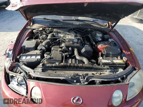 1992 Lexus SC 400 z VIN JT8UZ30C8N0002863, wystawiony jako Copart lot #69550415 z przebiegiem 141 192 mil mil oraz Szkoda całkowita • Salvage title. Historia ofert i sprzedaży dostępna na DreamBid. Obrazek 11.