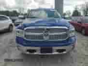 2014 Ram 1500 Laramie z VIN 1C6RR7VM0ES387931, wystawiony jako Copart lot #56866025 z przebiegiem 149 710 mil mil oraz Czysty tytuł • Clean title. Historia ofert i sprzedaży dostępna na DreamBid. Obrazek 5.