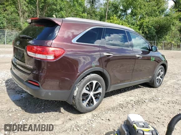 2016 Kia Sorento EX with VIN 5XYPHDA18GG029689, listed as a Copart auction lot 70298615 with 154,344 mi miles and Salvage title. Bid and sale history available at DreamBid. Image 3.