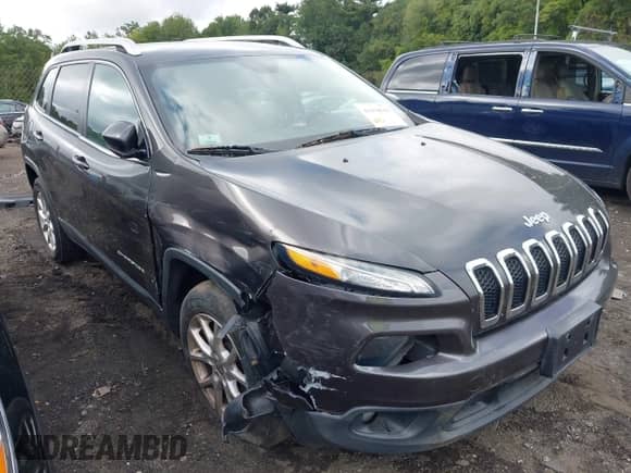 2014 Jeep Cherokee Latitude with VIN 1C4PJMCS5EW200506, listed as a IAAI auction lot 43158630 with 148,814 mi miles and . Bid and sale history available at DreamBid. Image 1.