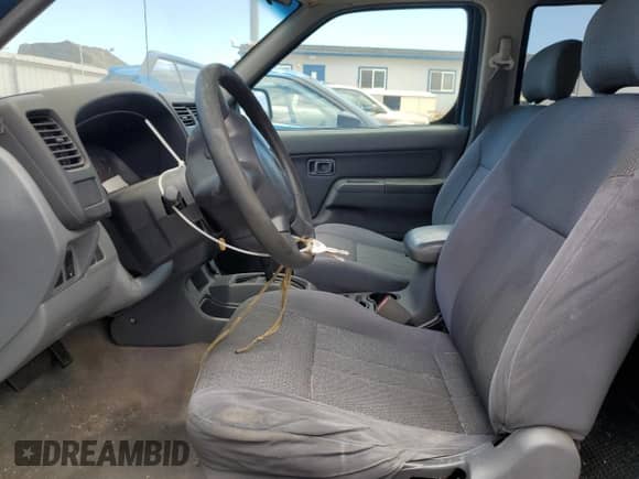 2001 Nissan Frontier SE with VIN 1N6ED27T91C390230, listed as a Copart auction lot 58844905 with 157,883 mi miles and Salvage title. Bid and sale history available at DreamBid. Image 7.