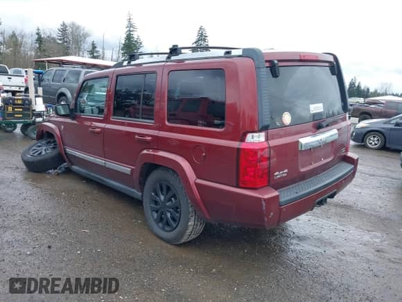 2007 Jeep Commander Limited with VIN 1J8HG58P77C573878, listed as a IAAI auction lot 41843633 with 154,584 mi miles and . Bid and sale history available at DreamBid. Image 3.