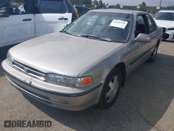 1993 Honda Accord with VIN 1HGCB7274PA010997, listed as a IAAI auction lot 43185754 with 174,206 mi miles and . Bid and sale history available at DreamBid. Image 2.