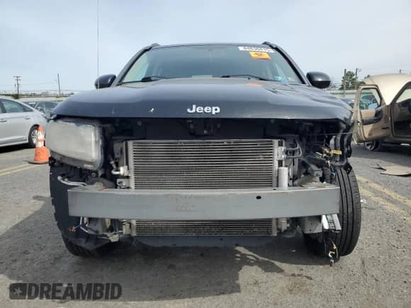 2014 Jeep Compass Latitude with VIN 1C4NJCEB1ED522330, listed as a Copart auction lot 84630415 with 150,480 mi miles and Salvage title. Bid and sale history available at DreamBid. Image 5.