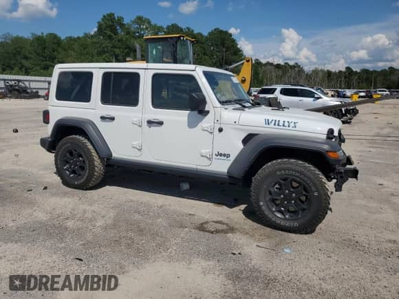 2023 Jeep Wrangler with VIN 1C4JJXN62PW613106, listed as a Copart auction lot 61717015 with 18,365 mi miles and Clean title. Bid and sale history available at DreamBid. Image 4.