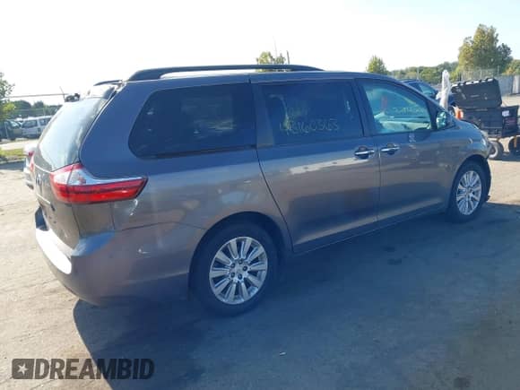 2015 Toyota Sienna Limited with VIN 5TDDK3DCXFS105328, listed as a IAAI auction lot 43160363 with 164,426 mi miles and . Bid and sale history available at DreamBid. Image 4.