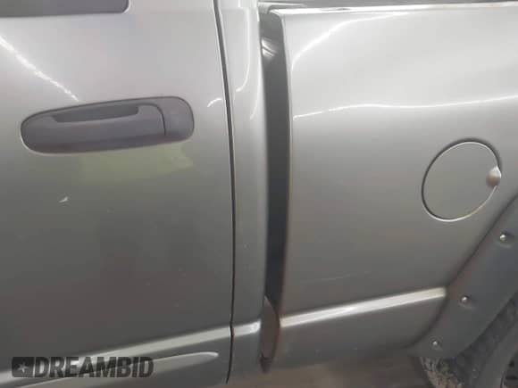 2007 Dodge 1500 SLT z VIN 1D7HU18257J523396, wystawiony jako IAAI lot #43312304 z przebiegiem 221 564 mil mil oraz . Historia ofert i sprzedaży dostępna na DreamBid. Obrazek 12.