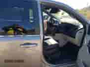 2019 Dodge Grand Caravan SXT with VIN 2C4RDGCG4KR542272, listed as a IAAI auction lot 43416884 with 79,961 mi miles and . Bid and sale history available at DreamBid. Image 5.