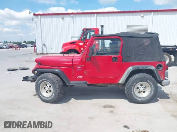1998 Jeep Wrangler Sport z VIN 1J4FY19S6WP780710, wystawiony jako IAAI lot #43029249 z przebiegiem 205 060 mil mil oraz . Historia ofert i sprzedaży dostępna na DreamBid. Obrazek 14.