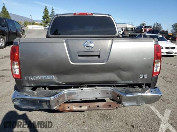 2009 Nissan Frontier SE with VIN 1N6AD07U49C405420, listed as a Copart auction lot 41983545 with 203,700 mi miles and Salvage title. Bid and sale history available at DreamBid. Image 6.