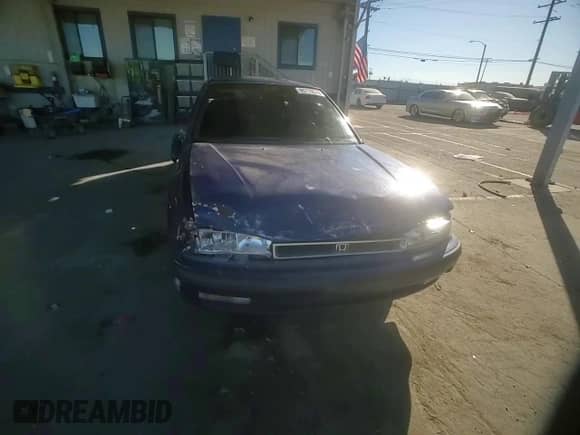 1990 Honda Accord LX z VIN JHMCB765XLC127200, wystawiony jako Copart lot #80770574 z przebiegiem 142 628 mil mil oraz Szkoda całkowita • Salvage title. Historia ofert i sprzedaży dostępna na DreamBid. Obrazek 11.