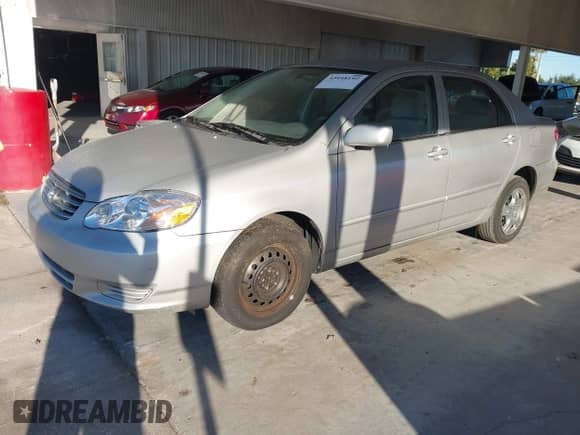 2003 Toyota Corolla CE с VIN 1NXBR32E93Z176434, выставлен на аукционе IAAI как лот 43448192 с пробегом 210 496 миль миль и . История ставок и продаж доступна на DreamBid. Изображение 2.