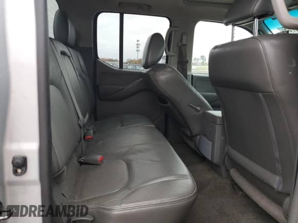 2011 Nissan Frontier Pro-4X z VIN 1N6AD0EVXBC416696, wystawiony jako Copart lot #90623765 z przebiegiem 161 124 mil mil oraz Szkoda całkowita • Salvage title. Historia ofert i sprzedaży dostępna na DreamBid. Obrazek 10.