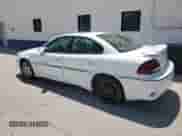 2002 Pontiac Grand Am GT z VIN 1G2NW52E42M549744, wystawiony jako Copart lot #57678605 z przebiegiem 220 067 mil mil oraz Szkoda całkowita • Salvage title. Historia ofert i sprzedaży dostępna na DreamBid. Obrazek 2.