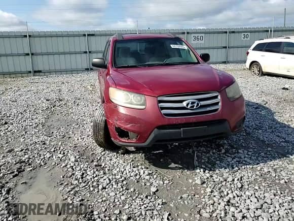 2012 Hyundai Santa Fe GLS с VIN 5XYZG3AB6CG124793, выставлен на аукционе Copart как лот 68792845 с пробегом 263 793 миль миль и Списание • Salvage title. История ставок и продаж доступна на DreamBid. Изображение 14.