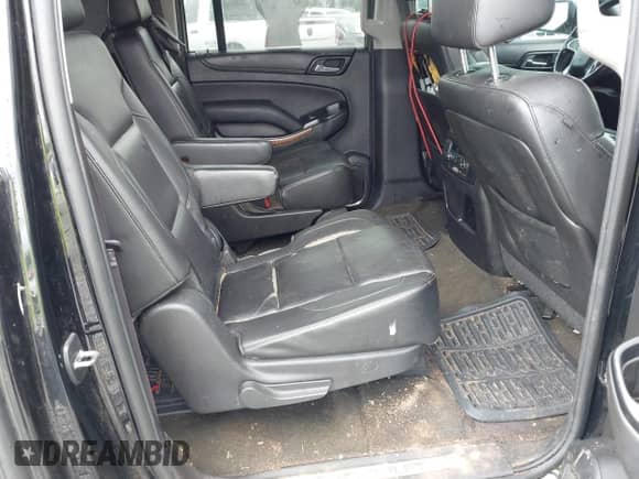 2015 Chevrolet Suburban LTZ z VIN 1GNSKKKC0FR119748, wystawiony jako IAAI lot #42932991 z przebiegiem 283 577 mil mil oraz . Historia ofert i sprzedaży dostępna na DreamBid. Obrazek 8.