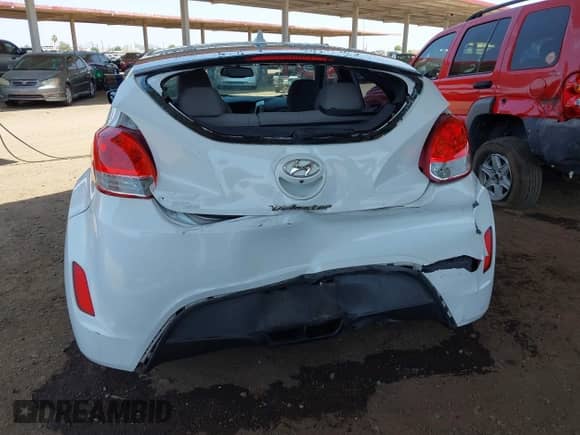 2014 Hyundai Veloster with VIN KMHTC6ADXEU209850, listed as a IAAI auction lot 42726384 with 128,523 mi miles and . Bid and sale history available at DreamBid. Image 16.