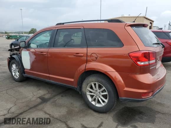 2014 Dodge Journey SXT with VIN 3C4PDCBB7ET118785, listed as a Copart auction lot 81487285 with 166,780 mi miles and Salvage title. Bid and sale history available at DreamBid. Image 2.