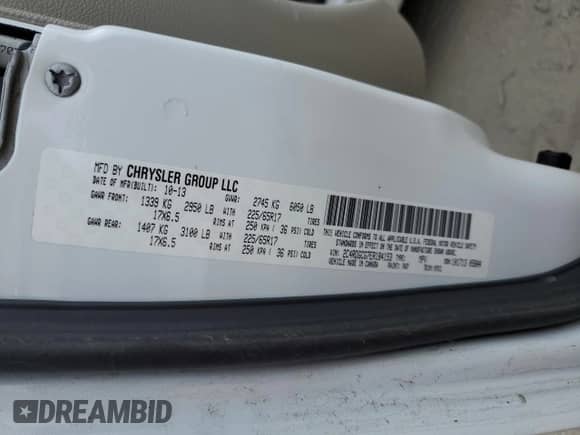 2014 Dodge Grand Caravan SXT 30th Anniversary with VIN 2C4RDGCG7ER184153, listed as a Copart auction lot 64866445 with 193,640 mi miles and Clean title. Bid and sale history available at DreamBid. Image 12.
