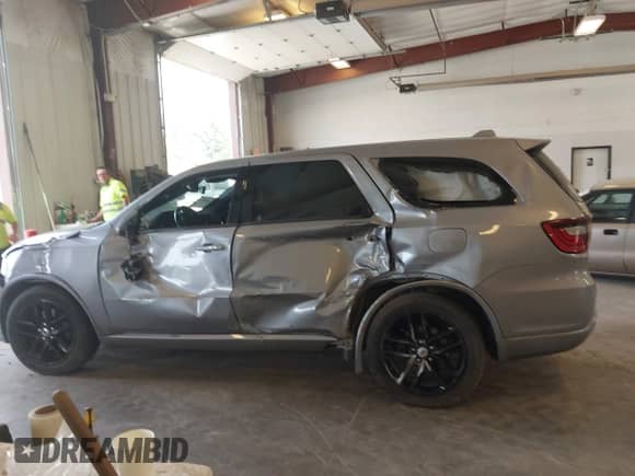 2021 Dodge Durango GT Plus with VIN 1C4RDJDG3MC659249, listed as a IAAI auction lot 42530045 with 92,924 mi miles and . Bid and sale history available at DreamBid. Image 14.