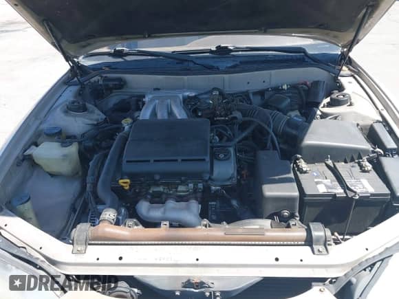 1995 Toyota Camry LE z VIN 4T1GK12E0SU860849, wystawiony jako IAAI lot #42358373 z przebiegiem 162 463 mil mil oraz . Historia ofert i sprzedaży dostępna na DreamBid. Obrazek 10.