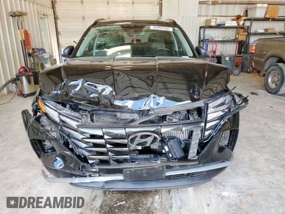 2024 Hyundai Tucson SEL Convenience with VIN KM8JCCD12RU141489, listed as a Copart auction lot 69904385 with 24,348 mi miles and Salvage title. Bid and sale history available at DreamBid. Image 5.