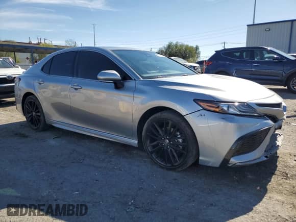 2023 Toyota Camry Hybrid XSE с VIN 4T1K31AKXPU609407, выставлен на аукционе Copart как лот 66486835 с пробегом 26 892 миль миль и Списание • Salvage title. История ставок и продаж доступна на DreamBid. Изображение 4.