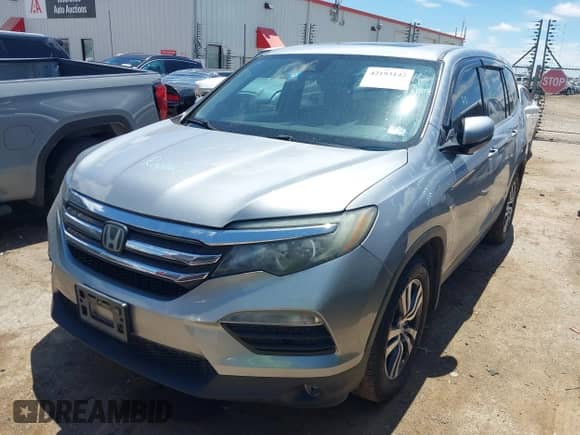 2018 Honda Pilot EX-L with VIN 5FNYF5H61JB008134, listed as a IAAI auction lot 42193142 with 100,254 mi miles and . Bid and sale history available at DreamBid. Image 17.