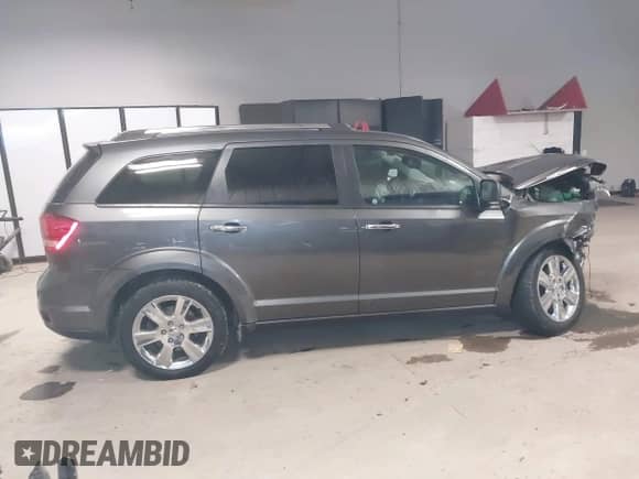 2015 Dodge Journey Limited with VIN 3C4PDDDG8FT566839, listed as a IAAI auction lot 41611563 with 88,553 mi miles and . Bid and sale history available at DreamBid. Image 14.